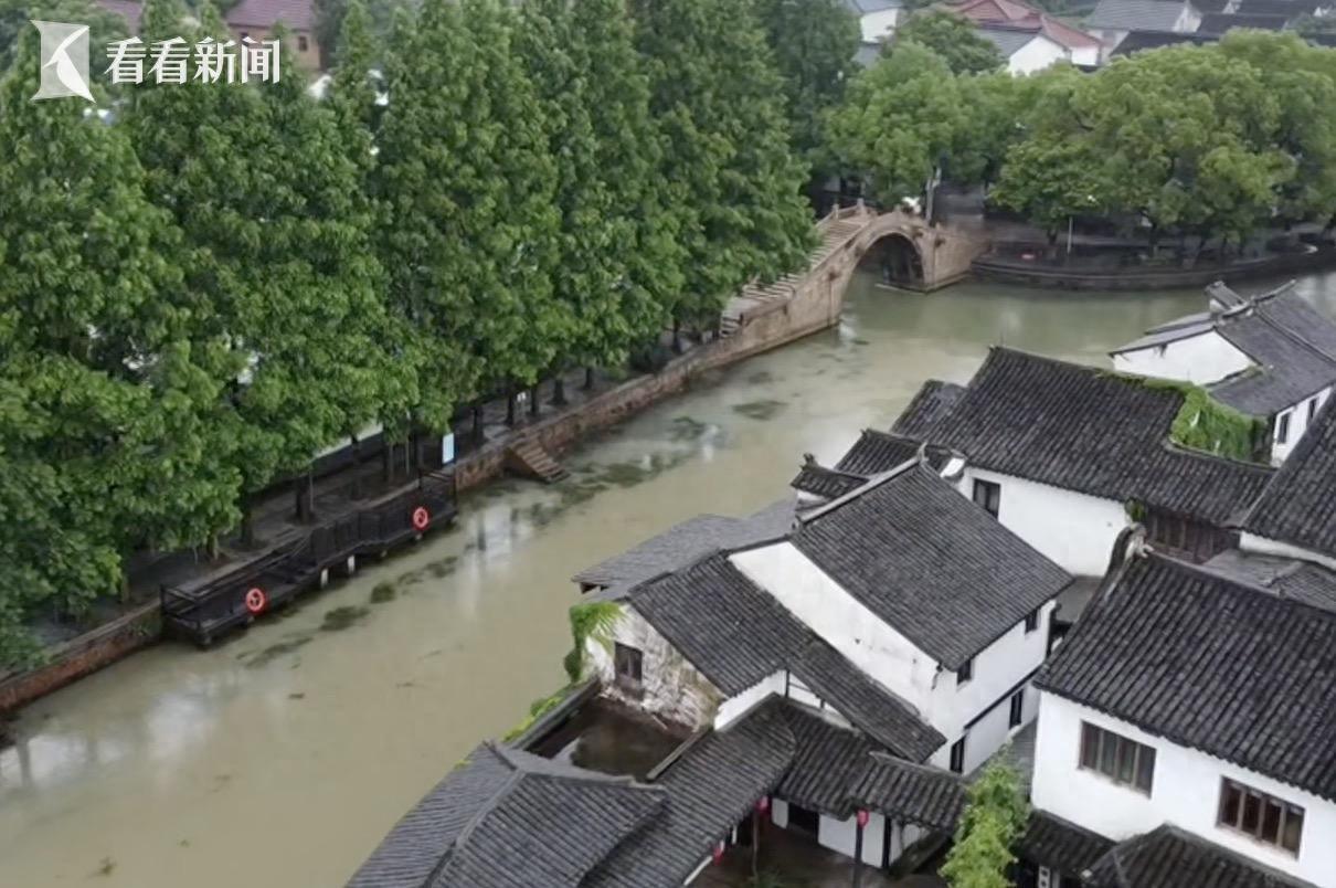 6 月 30 日申城青浦雨势减弱后又倾盆而下，淀浦河水位明显上升-萌番资讯网